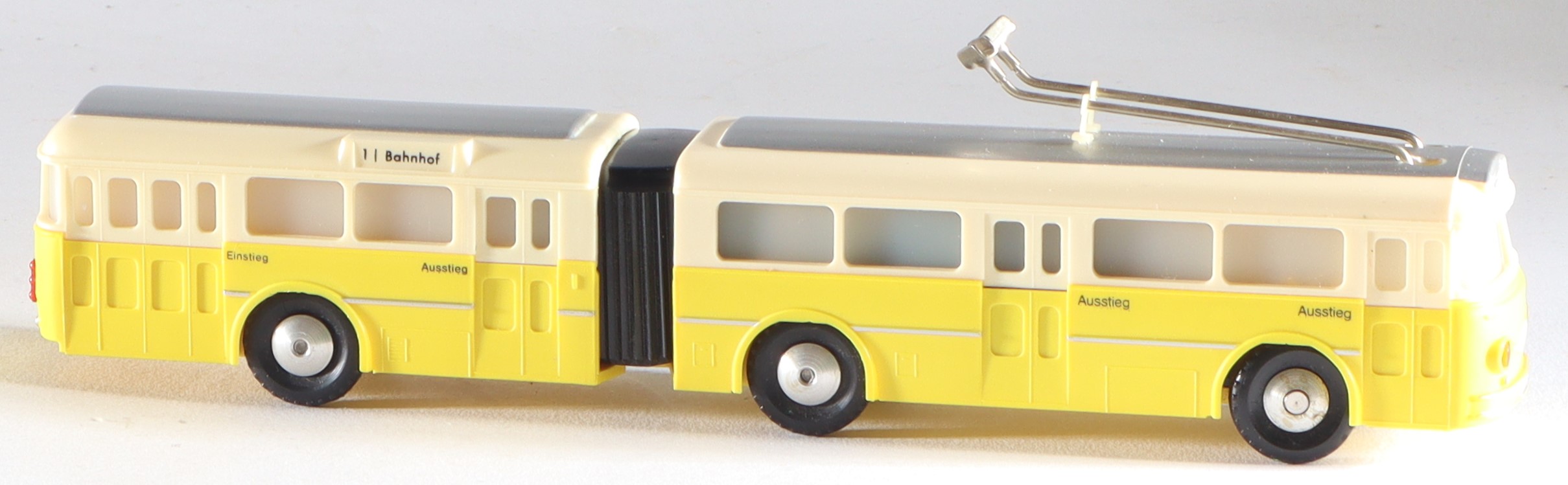 kallistoys-auctions-auktionen-antique-vintage-toys-antik-historisch-spielzeug-brawa-germany-trolleybus-spur-h0-gliederbus-6103-gelb-1j