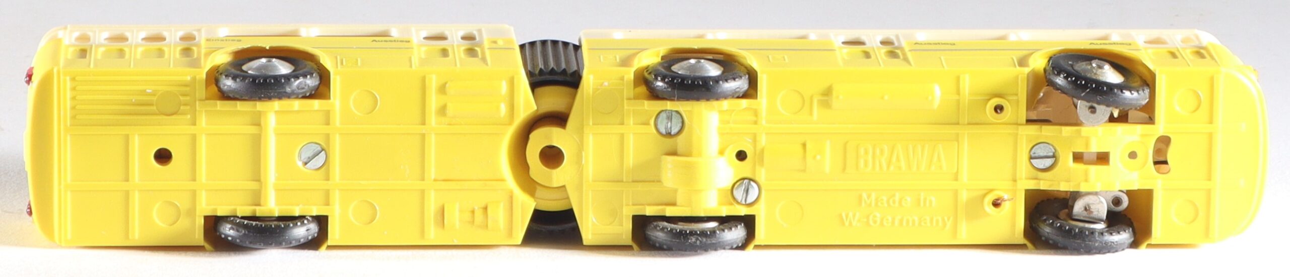 kallistoys-auctions-auktionen-antique-vintage-toys-antik-historisch-spielzeug-brawa-germany-trolleybus-spur-h0-gliederbus-6103-gelb-1n