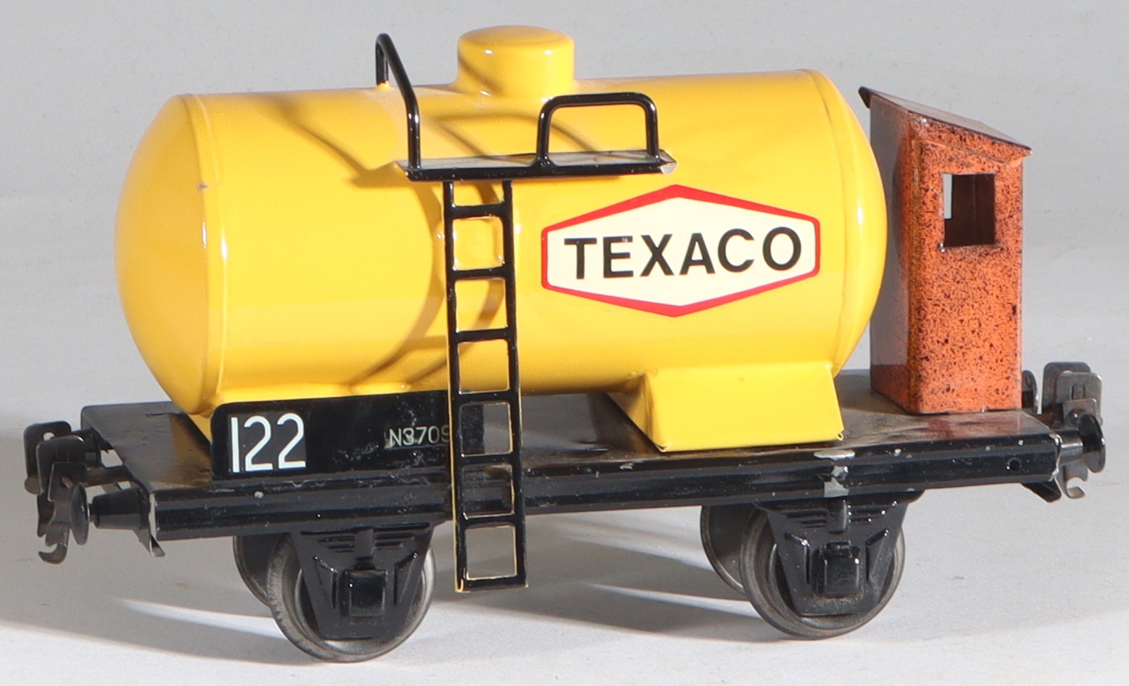 kallistoys-auctions-auktionen-antique-vintage-toys-antik-historisch-spielzeug-monos-switzerland-spur-0-tinplate-blech-train-eisenbahn-tank-wagon-kesselwagen-texaco-gelb-1a