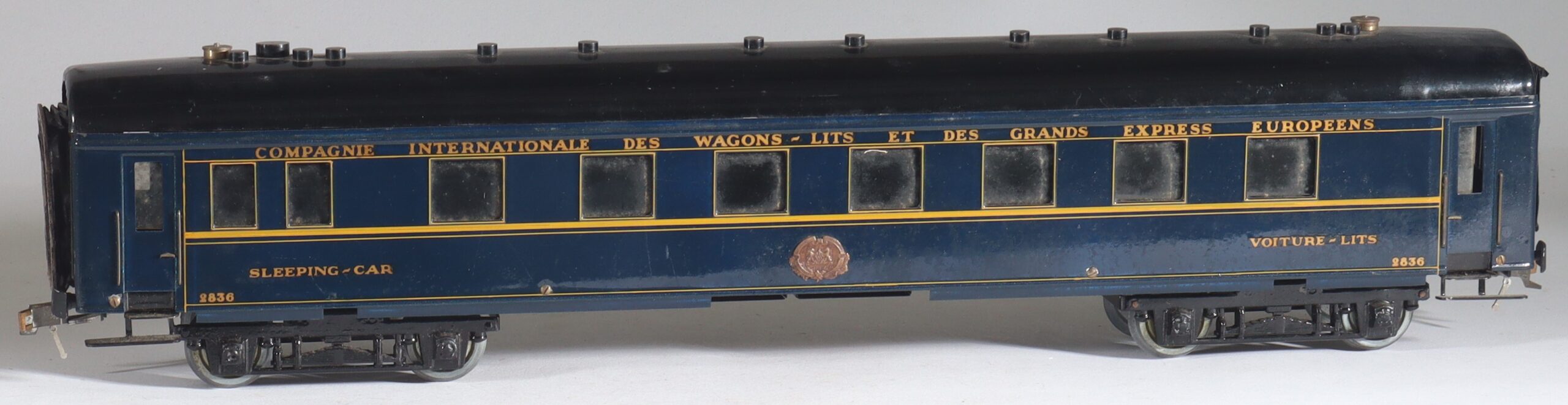 kallistoys-auctions-auktionen-antique-vintage-toys-antik-historisch-spielzeug-munier-france-spur-0-tinplate-blech-sleeping-car-schlafwagen-ciwl-blau-54-cm-1a