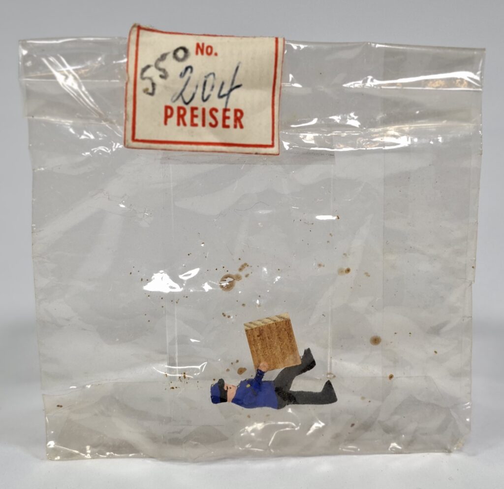 Preiser wooden figure #204 railway official with crate in original Cellon bag, c.1955