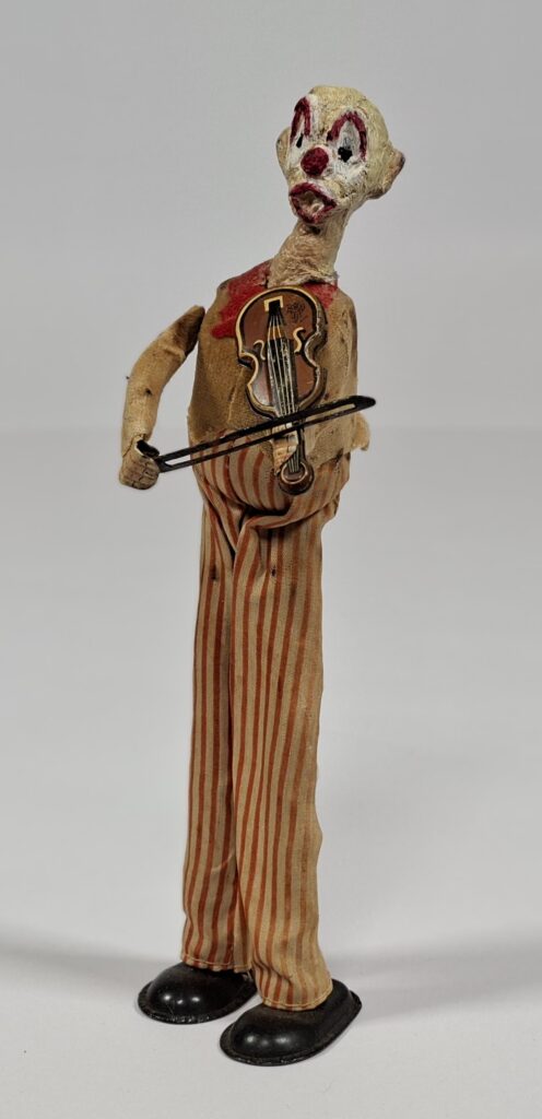 TPS Japan clockwork circus clown violinist, approx. 25 cm high, 1950s