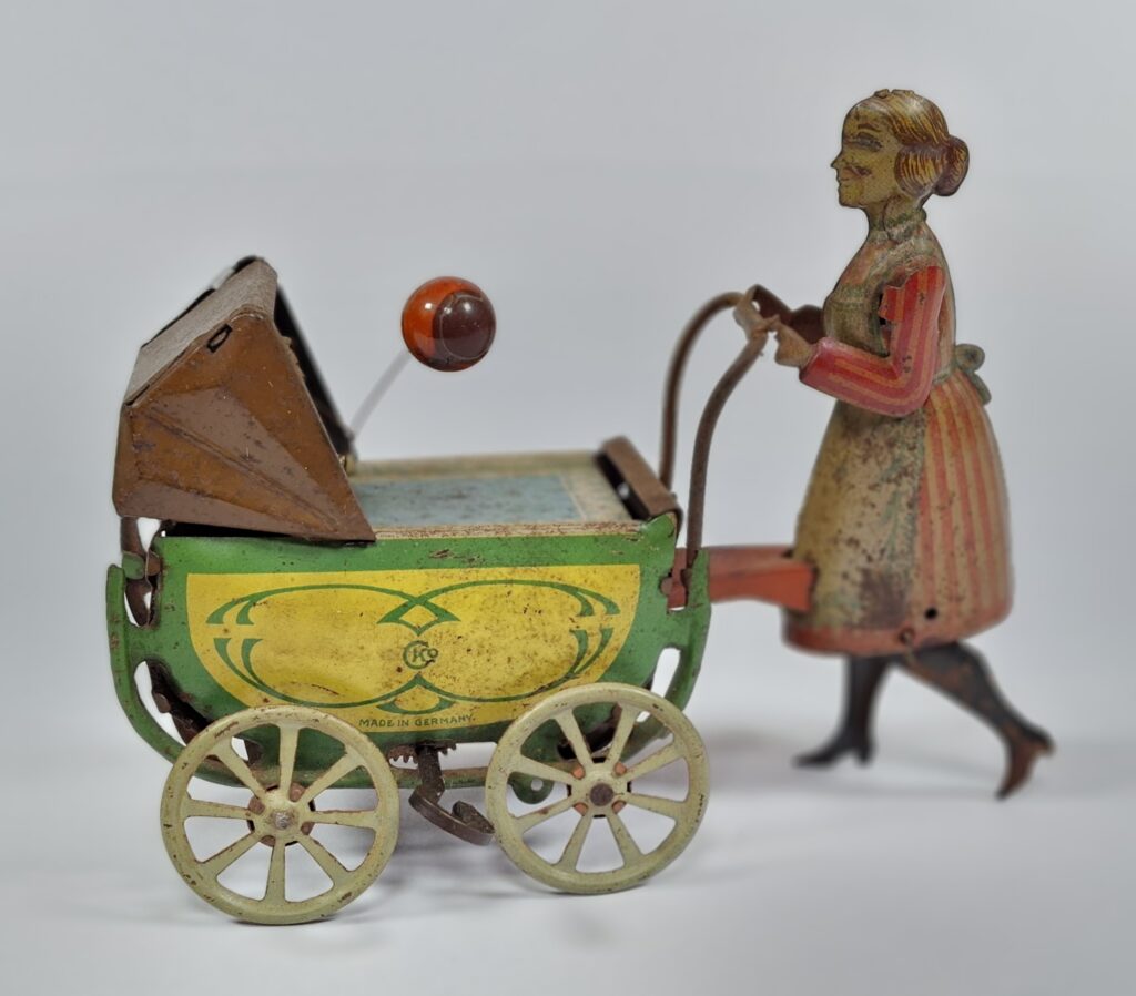 Kellermann CKO uralt Blechspielzeug Frau mit Kinderwagen und Ballon Länge ca 15 - 20 cm '20er Jahre