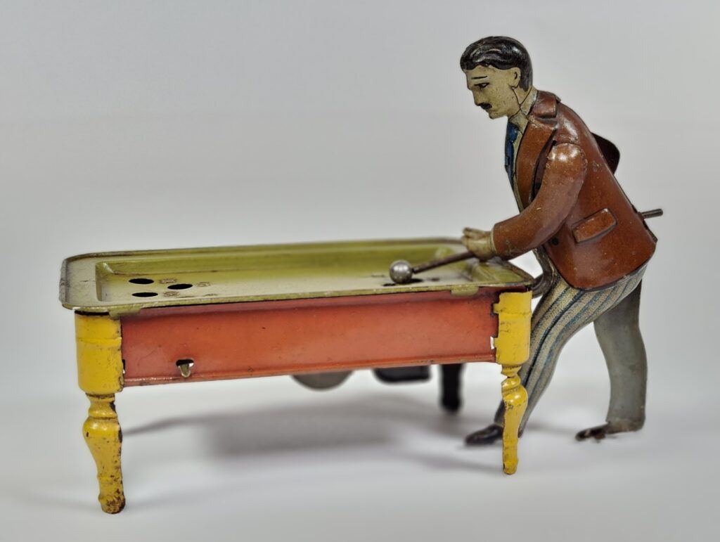 Günthermann antique tinplate clockwork billiard player at table with ball, approx. 15 cm, 1920s