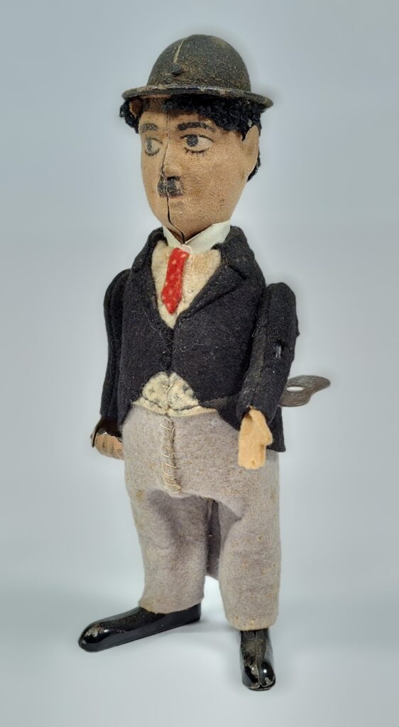 Schuco Charlie Chaplin mit Uhrwerk filzbezogen höhe ca 15 cm '30er Jahre