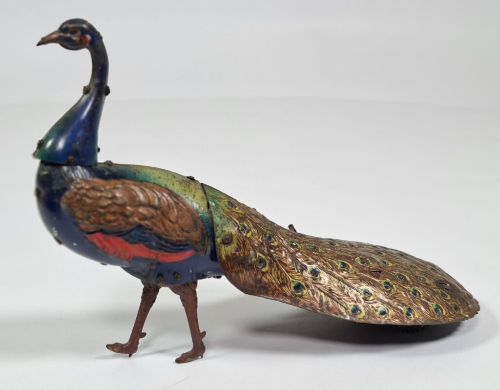 Ebo antique tinplate 'Pao Pao' peacock with clockwork and music, approx. 20 cm, 1920s